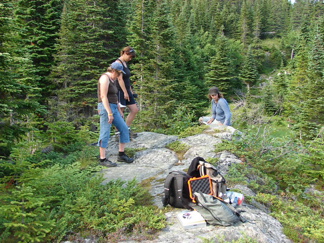 Rita Barrett, Mlissa Burns and Janine Williams record rock inscriptions on a rocky outcrop at Boutitou.